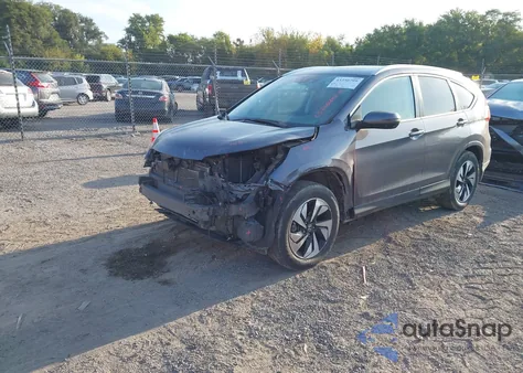 2016 Honda Cr-V Touring z USA, uszkodzony, nr VIN 5J6RM4H94GL137547